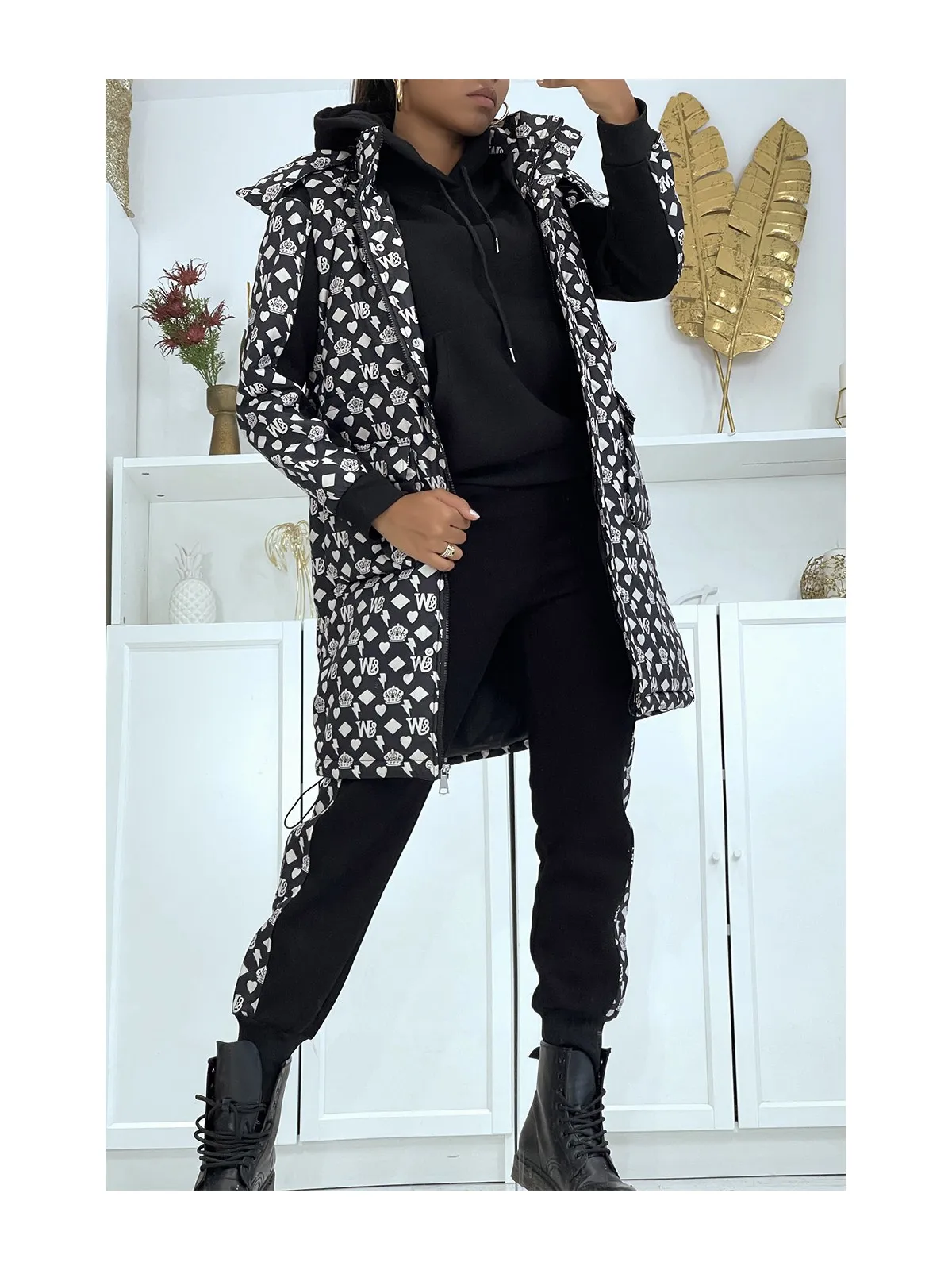 3-piece sleeveless puffer vest set with black patterned sweatshirt and joggers