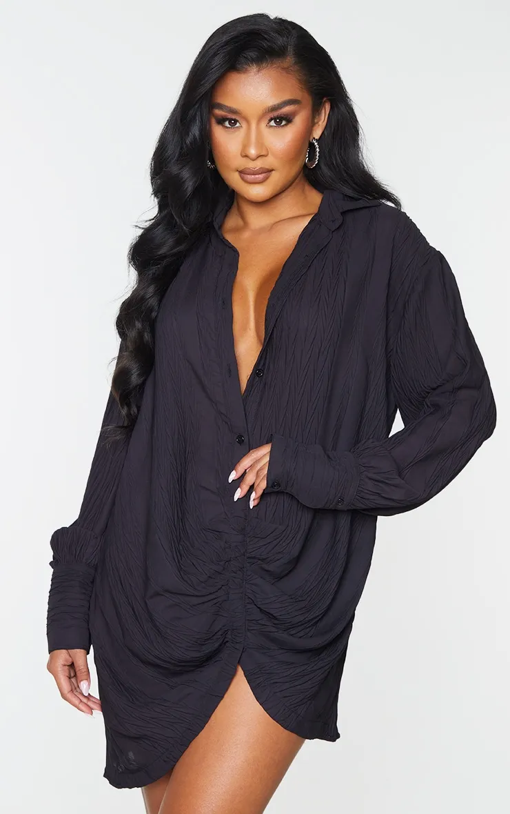 Black textured long sleeve blouse with front ruching