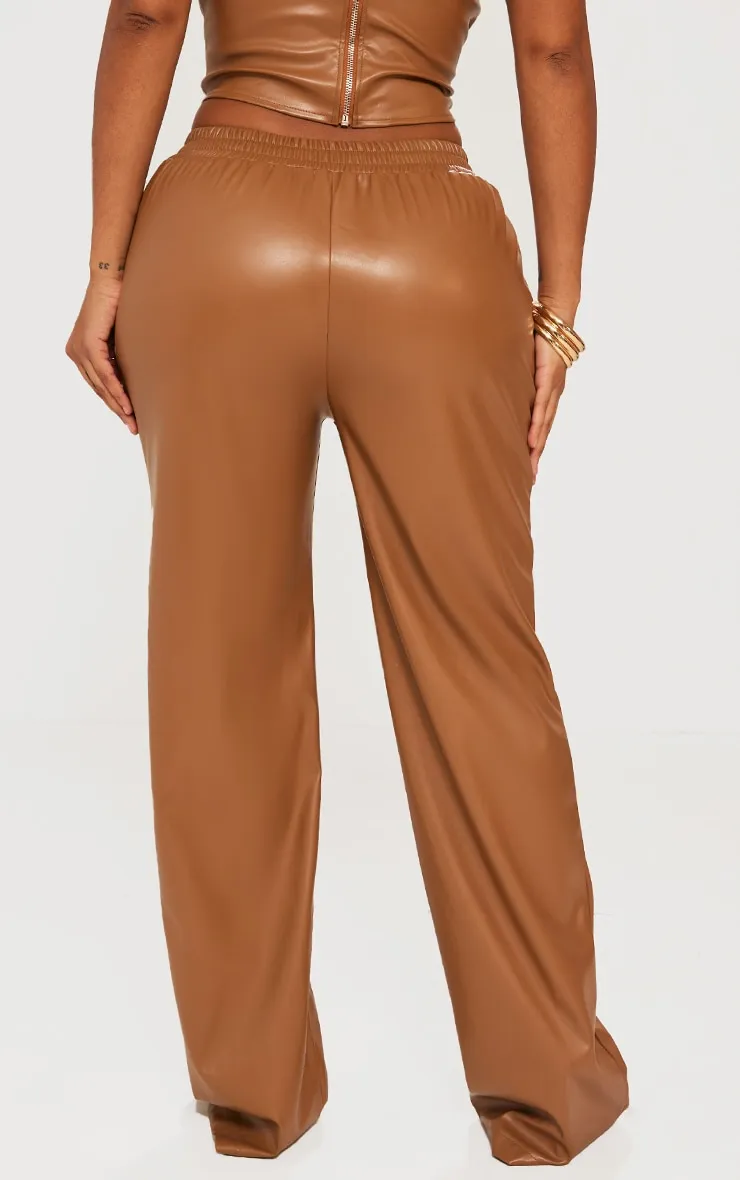 Brown PU Straight Leg Pants from PRETTYLITTLETHING