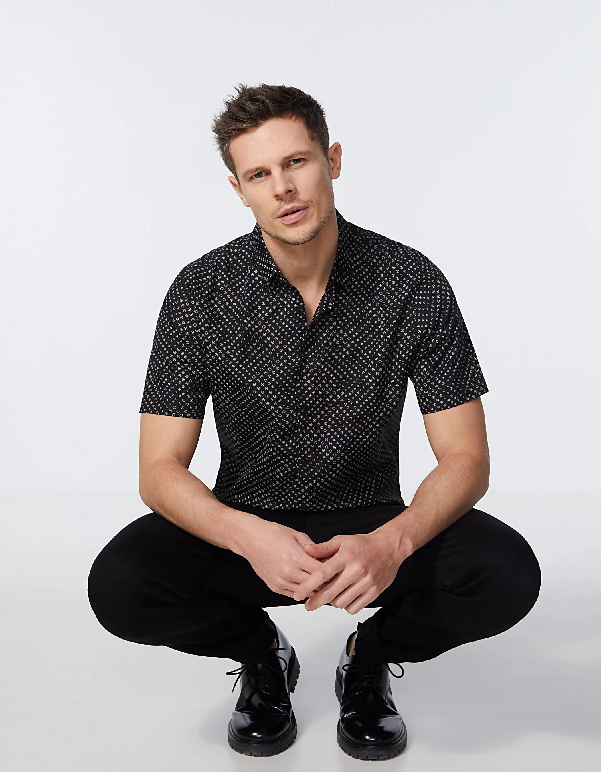 Regular Black Men's Shirt with Small Peace and Love Patterns.
