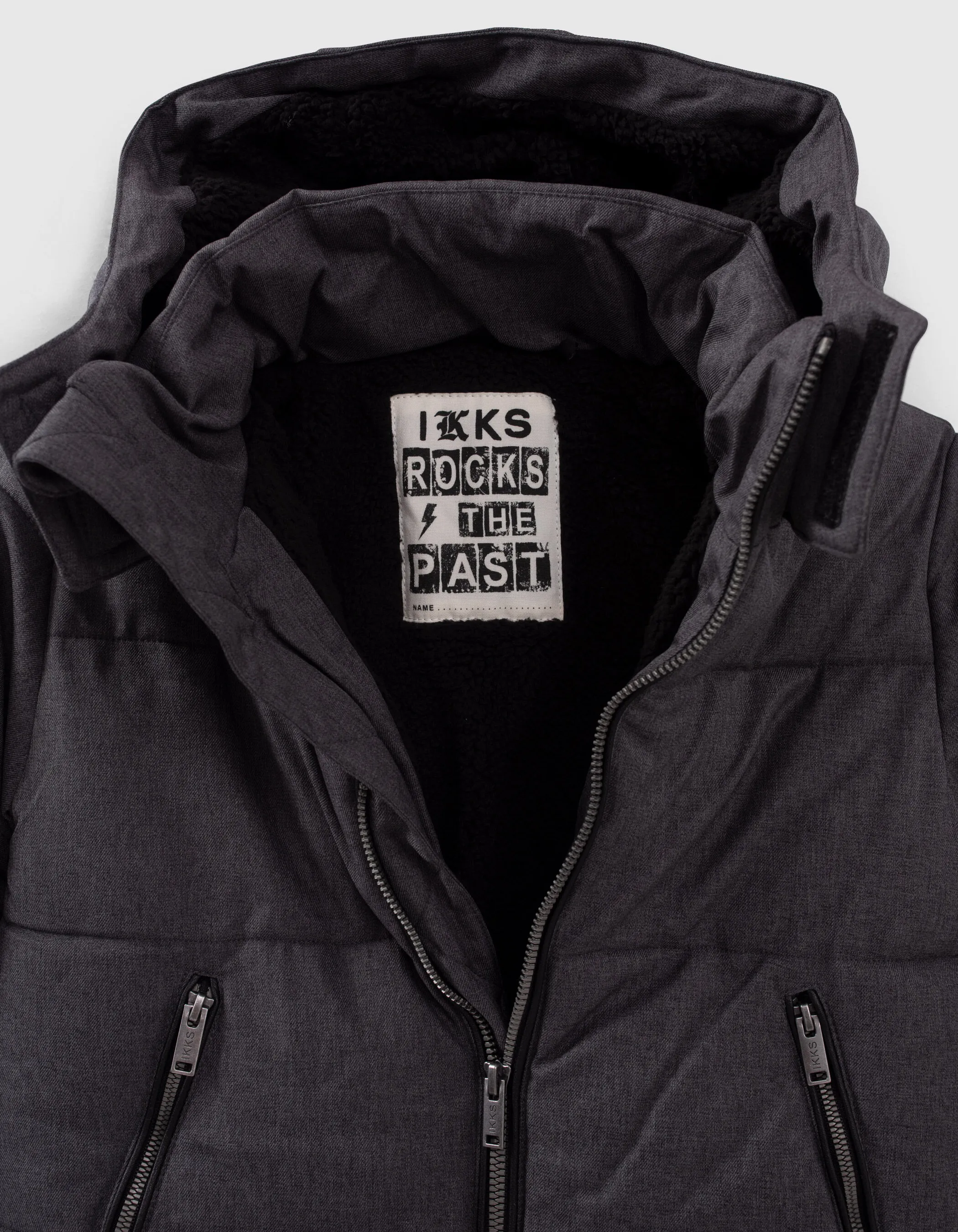 Gray boys' padded jacket with zip pockets.