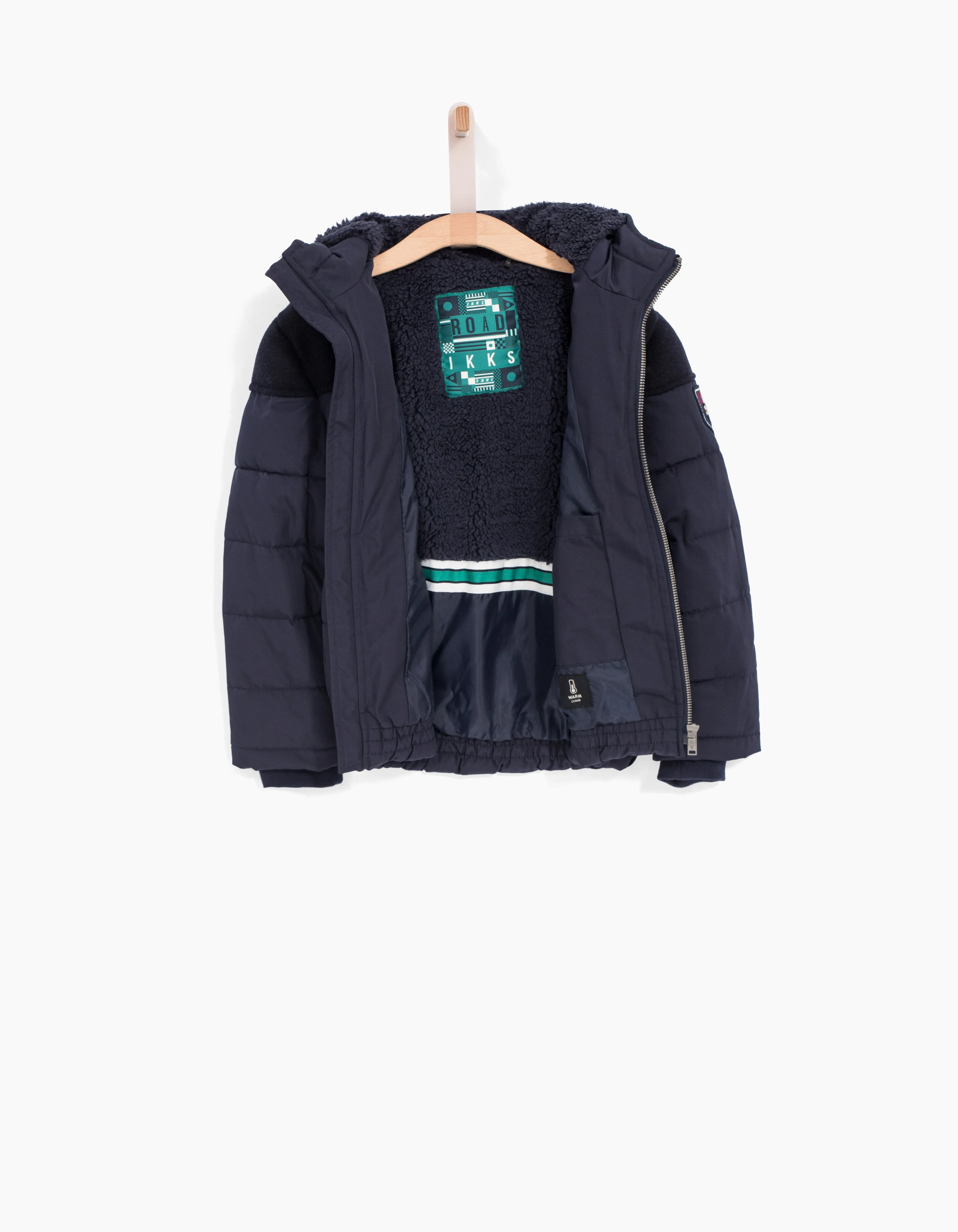 Navy two-tone jacket with sherpa lining for boys.
