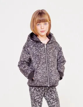 Black reversible jungle rock and solid black girl's puffer coat