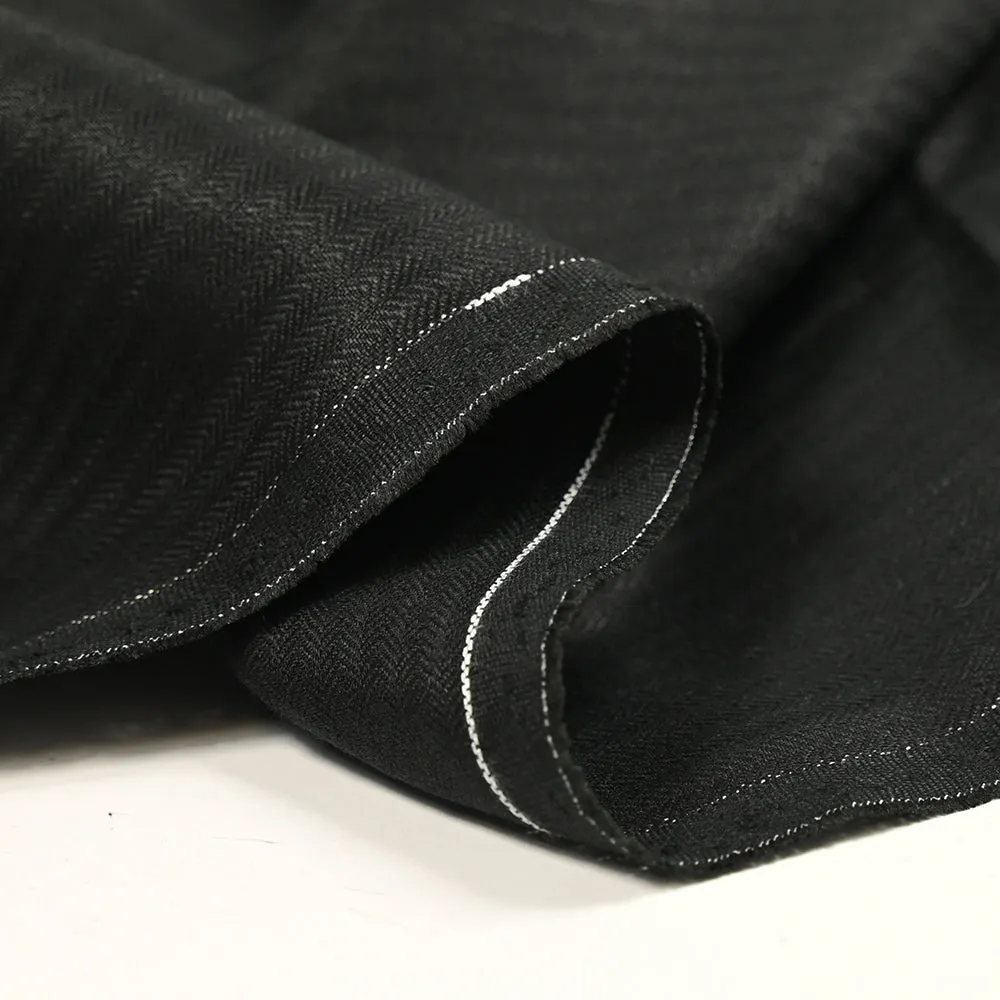 Tissu tailleur en lin rayures chevrons fond noir